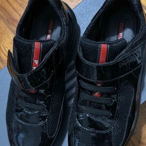 Prada Kids Black Sneakers with Red Highlights